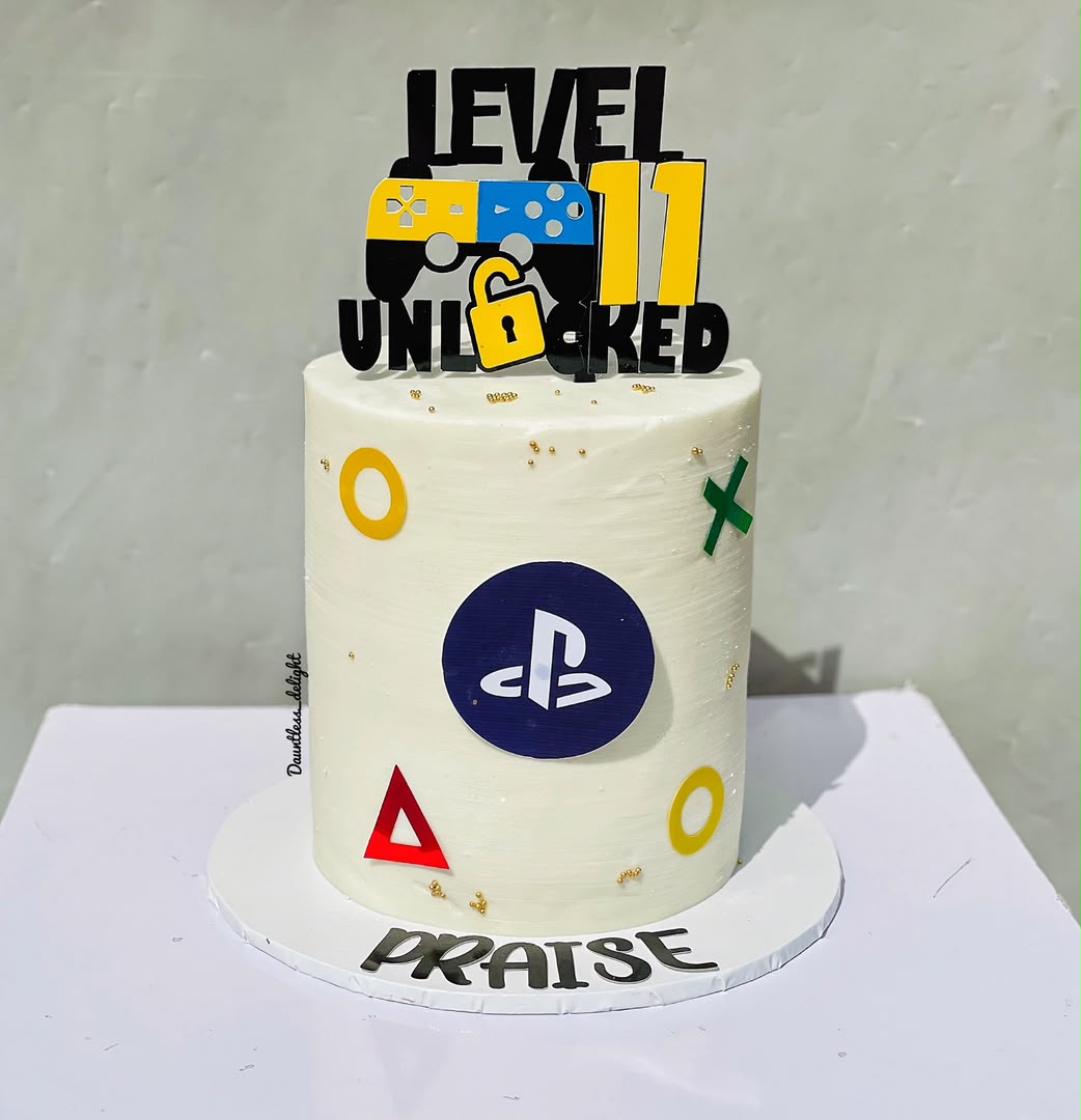 PlayStation gaming themed Level 11 Unlocked birthday cake